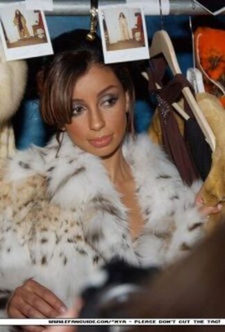 Maya wears a Lynx jacket for Marc Kaufman Furs In New York CIY