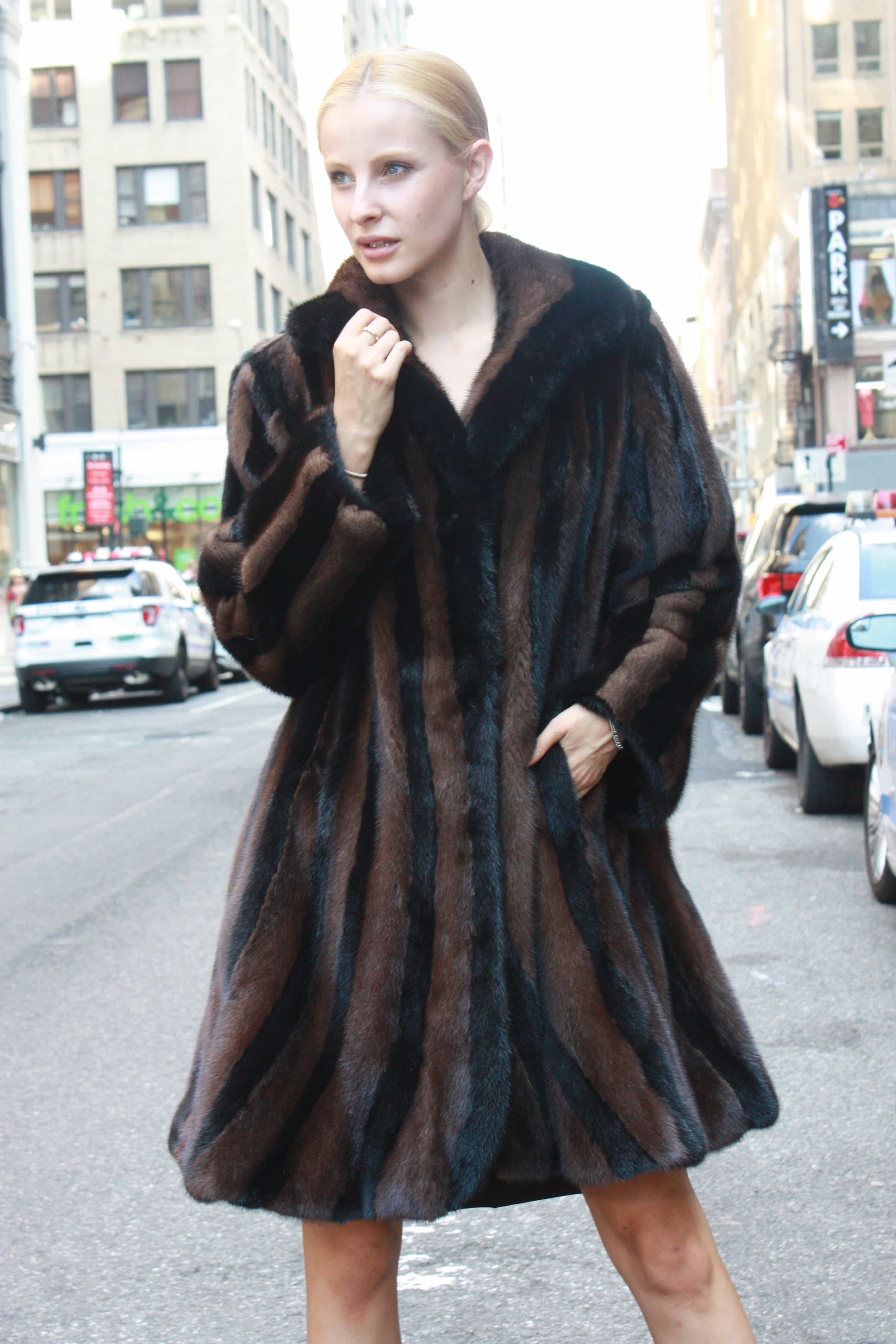 Marc Kaufman Furs Presents a black and brown mink fur swing stroller from Marc Kaufman Furs New York,Argentina,United Kingdom,Austria,Denmark,Norway,Australia,Finland,Saudi Arabia,Oman,Kuwait,Jordan,Egypt