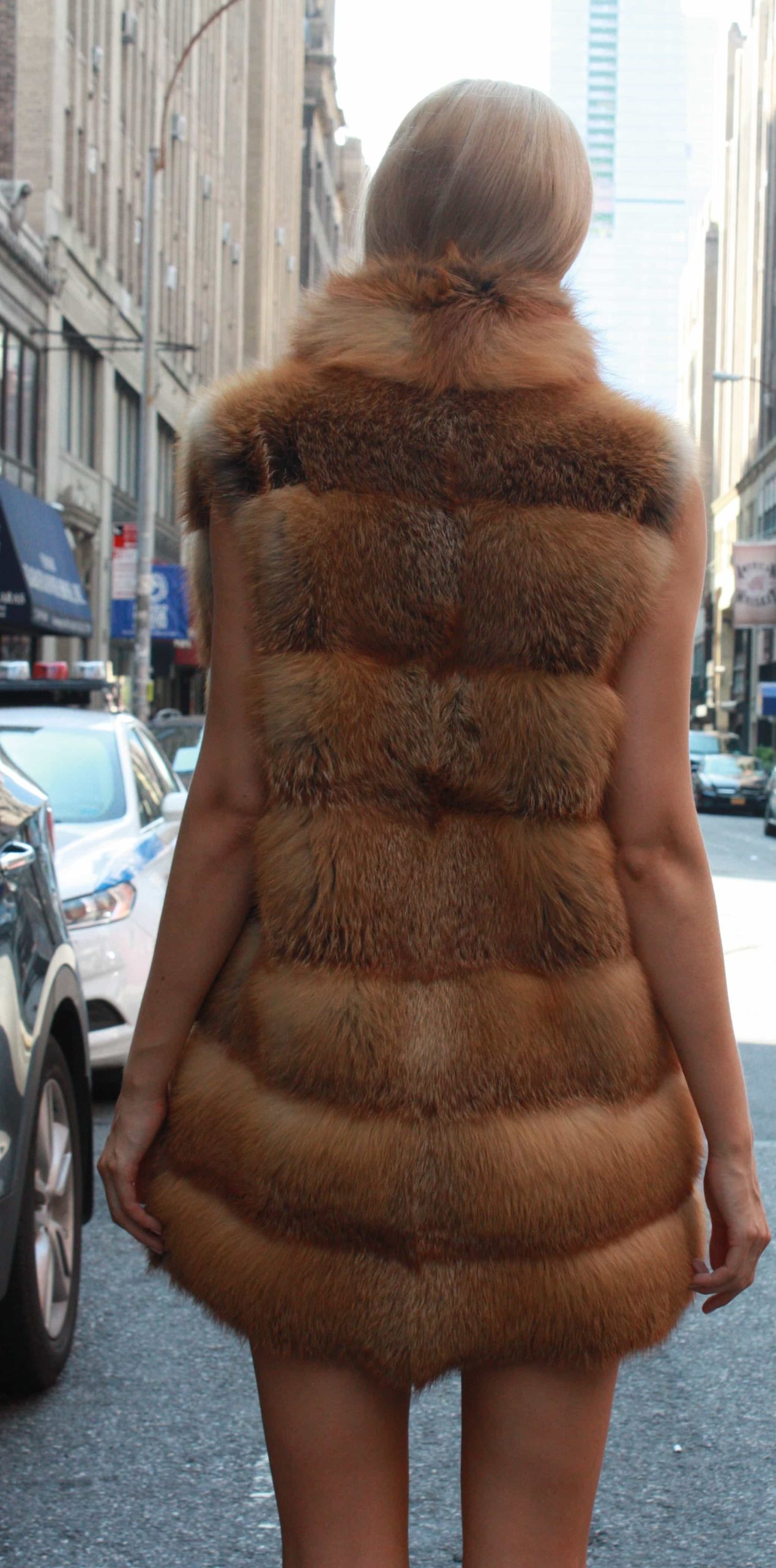 Marc Kaufman Furs Presents a red fox fur horizontal vest from Marc Kaufman Furs New York,Argentina,United Kingdom,Austria,Denmark,Norway,Australia,Finland,Saudi Arabia,Oman,Kuwait,Jordan,Egypt