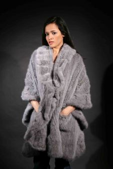 Marc Kaufman Furs Presents a sapphire knit mink fur cape with ruffles from Marc Kaufman Furs New York,Argentina,United Kingdom,Austria,Denmark,Norway,Australia,Finland,Saudi Arabia,Oman,Kuwait,Jordan,Egypt