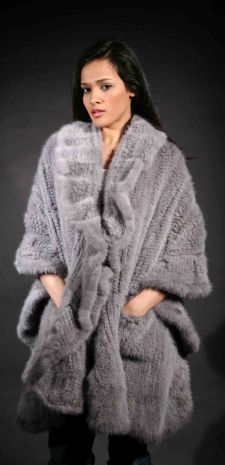 Marc Kaufman Furs Presents a sapphire knit mink fur cape with ruffles from Marc Kaufman Furs New York,Argentina,United Kingdom,Austria,Denmark,Norway,Australia,Finland,Saudi Arabia,Oman,Kuwait,Jordan,Egypt