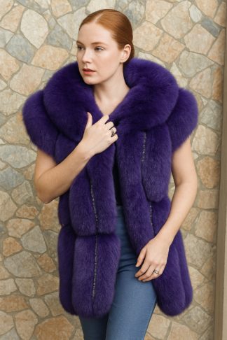 A dyed purple fox fur stole with crystal-trimmed panels, worn as a sleeveless vest.