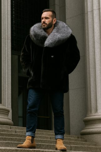 A ranch mink men's stroller featuring a voluminous full silver fox fur collar is worn outdoors.