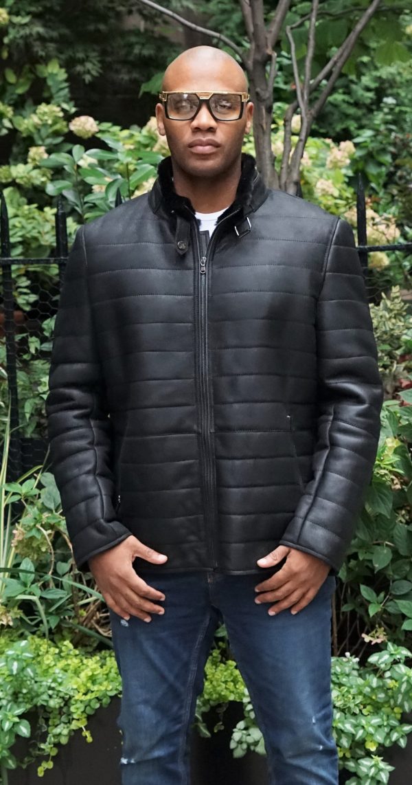 man wearing shearling jacket in black
