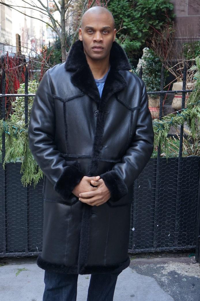 A man wearing a black jacket