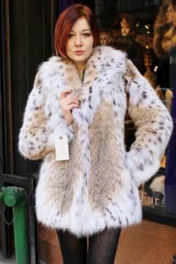 woman in a short fur jacket