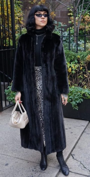 woman wearing an expensive mink fur coat
