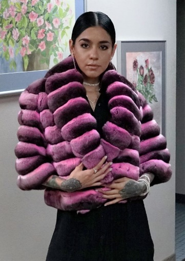 A Person Wearing Luxury Chinchilla Fur Coat 