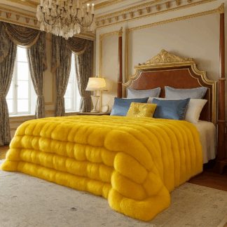 A king-size yellow fox bedspread drapes over a grand four-poster bed.